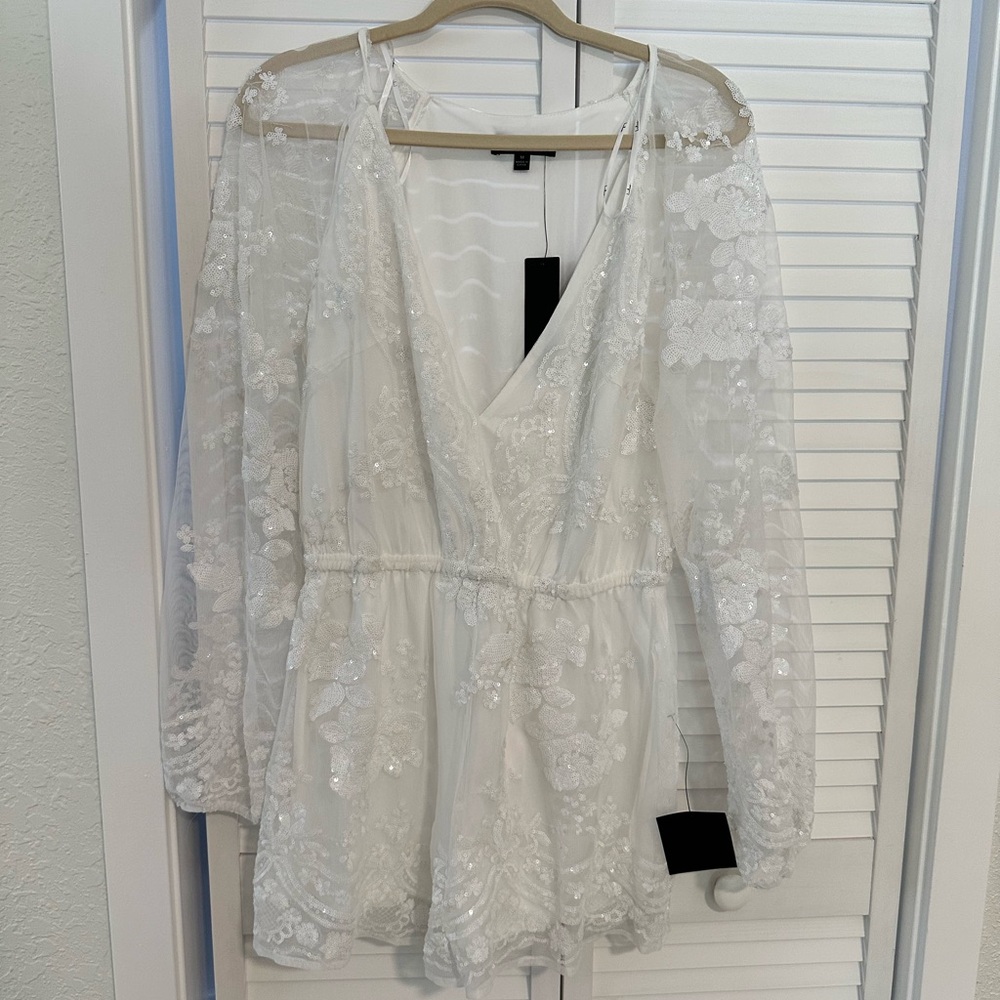 Bridal era alert! White sequenced short jumper M by Lulu’s